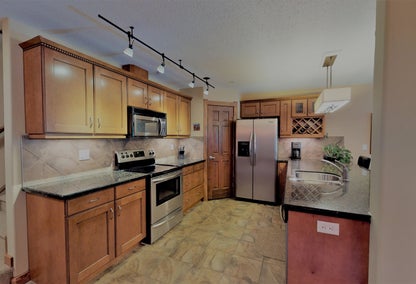 Large kitchen in a Riverstone neighbourhood home