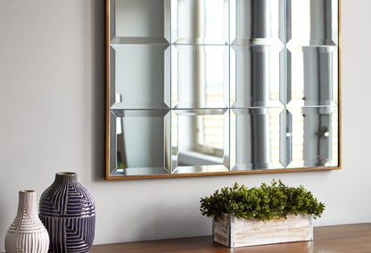 Entryway with large mirror, typical of a Lac Des Arc home